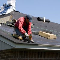 roofing contractors on a roof